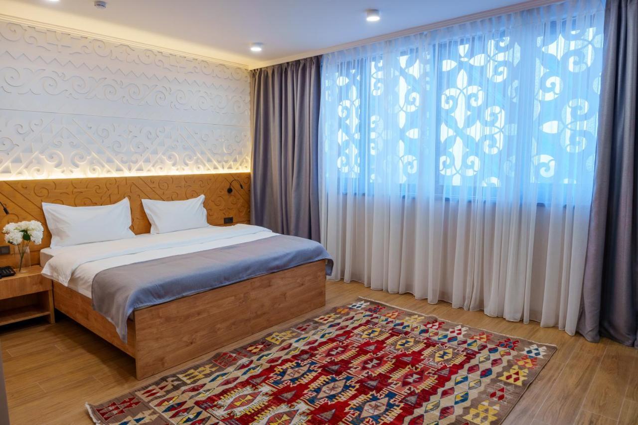 Dami Almaty Hotel Exterior foto