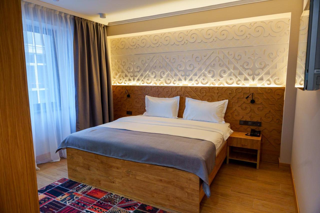 Dami Almaty Hotel Exterior foto